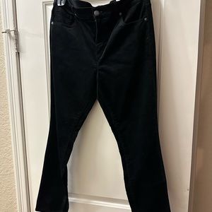 Brand new Black skinny jeans.  Velvet like fabric. Size 31 petite